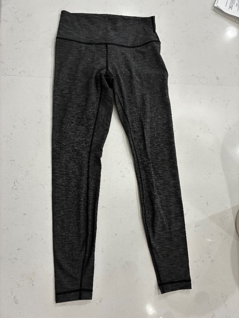 Like new lululemon leggings, size 8, heathered black